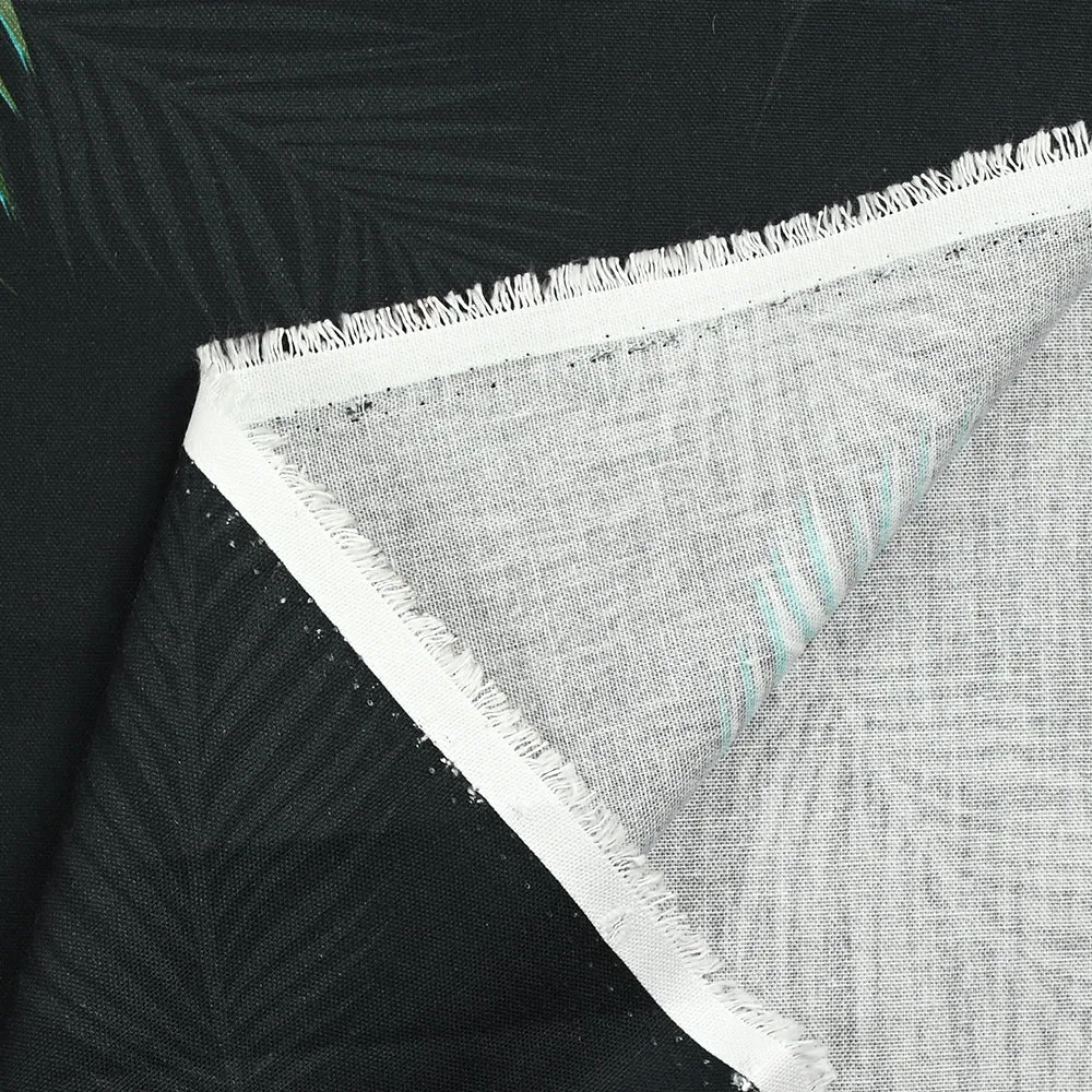Coton imprimé feuilles de palmier fond noir